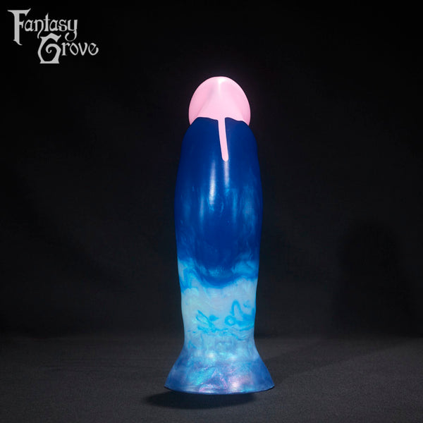 A fantasy sex toy on a black background with the Fantasy Grove logo in the upper left corner 