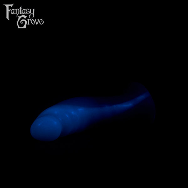 A fantasy sex toy on a black background with the Fantasy Grove logo in the upper left corner