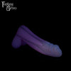 A Fantasy Grove sex toy on a black background with a logo in the upper left corner