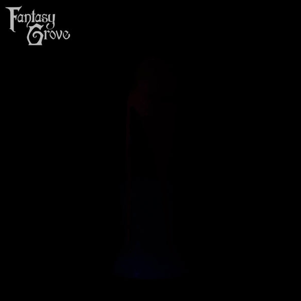 A fantasy sex toy on a black background with the Fantasy Grove logo in the upper left corner 