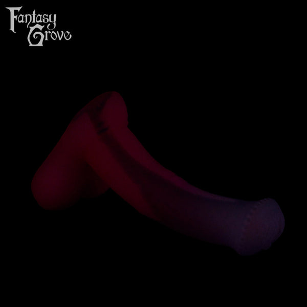 A Fantasy Grove sex toy on a black background with a logo in the upper left corner