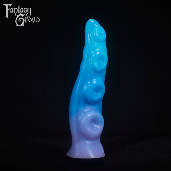 A fantasy sex toy on a black background with the Fantasy Grove logo in the upper left corner