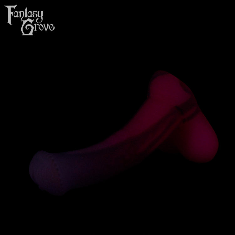A Fantasy Grove sex toy on a black background with a logo in the upper left corner