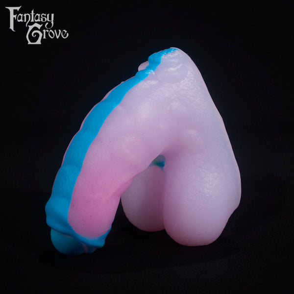 A fantasy sex toy on a black background with the Fantasy Grove logo in the upper left corner