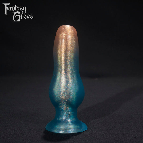 A fantasy sex toy on a black background with the Fantasy Grove logo in the upper left corner 