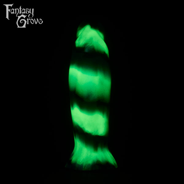 A fantasy sex toy on a black background with the Fantasy Grove logo in the upper left corner