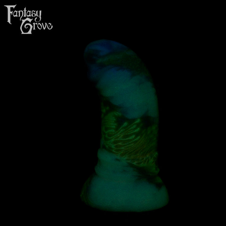 A fantasy sex toy on a black background with the Fantasy Grove logo in the upper left corner
