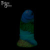 A fantasy sex toy on a black background with the Fantasy Grove logo in the upper left corner
