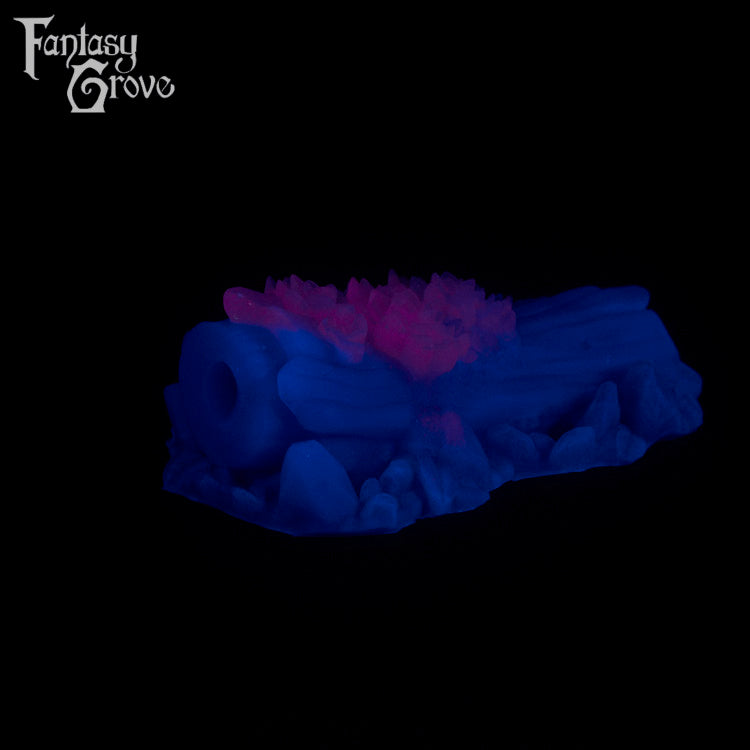 A fantasy sex toy on a black background with the Fantasy Grove logo in the upper left corner