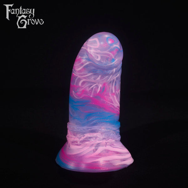 A fantasy sex toy on a black background with the Fantasy Grove logo in the upper left corner