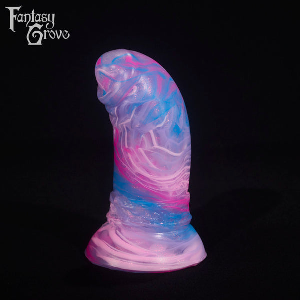 A fantasy sex toy on a black background with the Fantasy Grove logo in the upper left corner