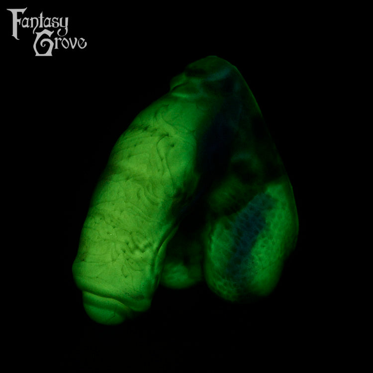 A fantasy sex toy on a black background with the Fantasy Grove logo in the upper left corner