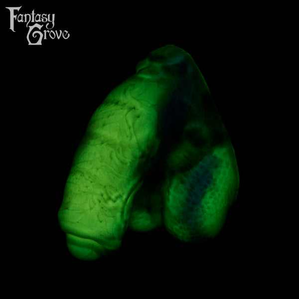 A fantasy sex toy on a black background with the Fantasy Grove logo in the upper left corner