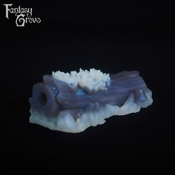 A fantasy sex toy on a black background with the Fantasy Grove logo in the upper left corner