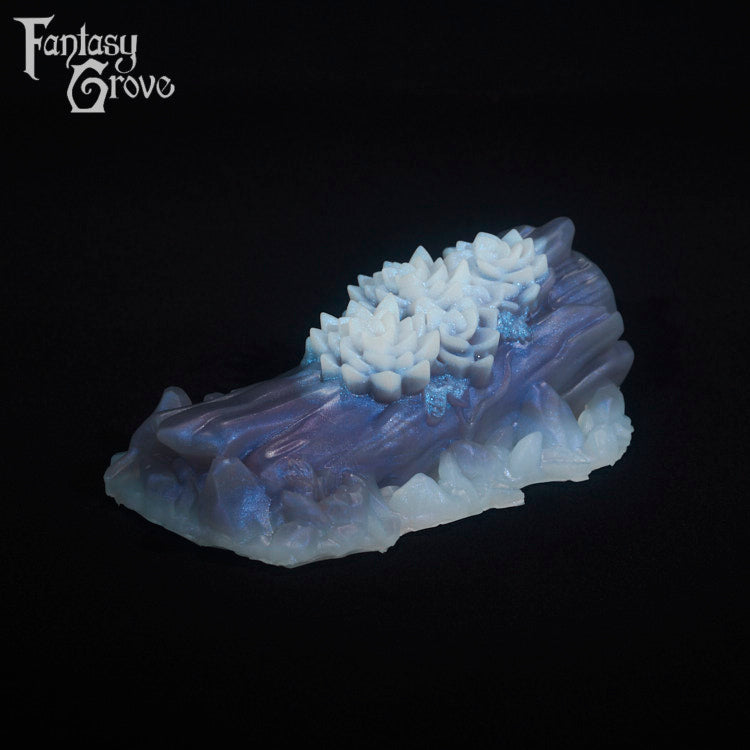 A fantasy sex toy on a black background with the Fantasy Grove logo in the upper left corner