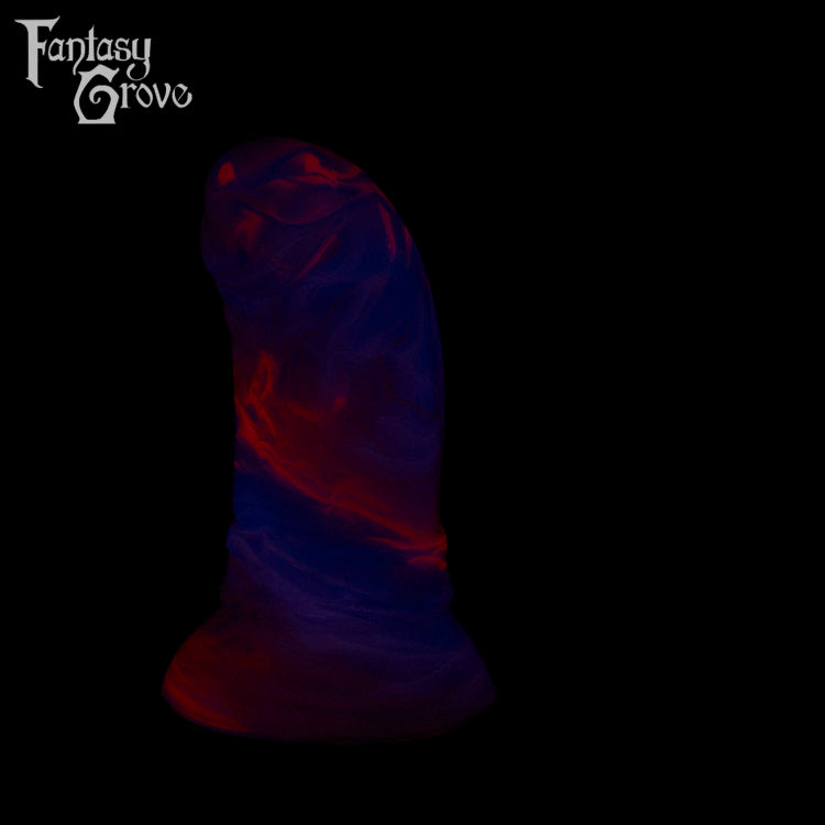 A fantasy sex toy on a black background with the Fantasy Grove logo in the upper left corner