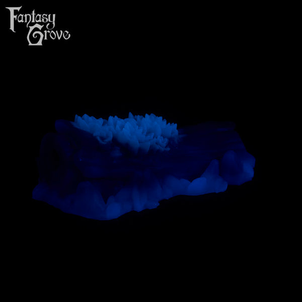 A fantasy sex toy on a black background with the Fantasy Grove logo in the upper left corner