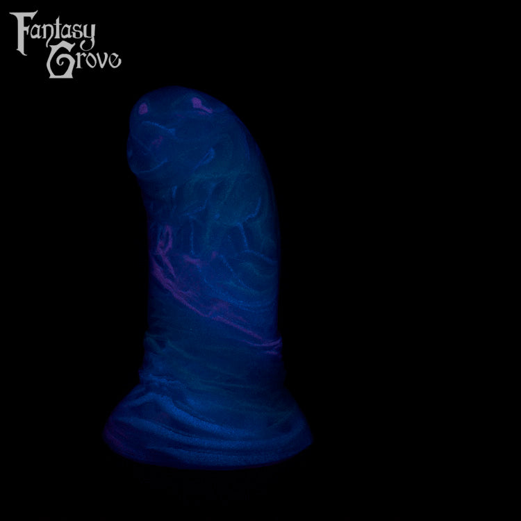 A fantasy sex toy on a black background with the Fantasy Grove logo in the upper left corner