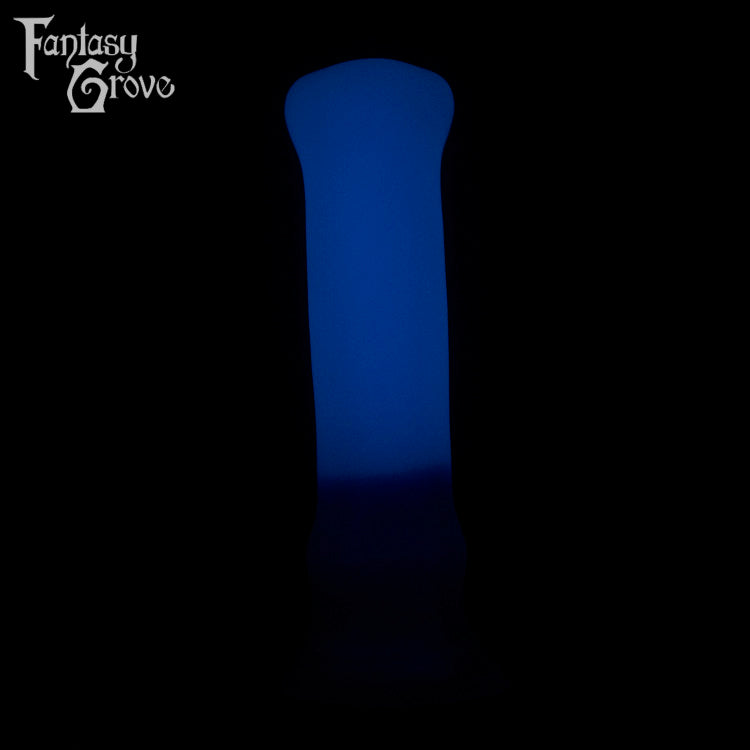 A Fantasy Grove sex toy on a black background with a logo in the upper left corner