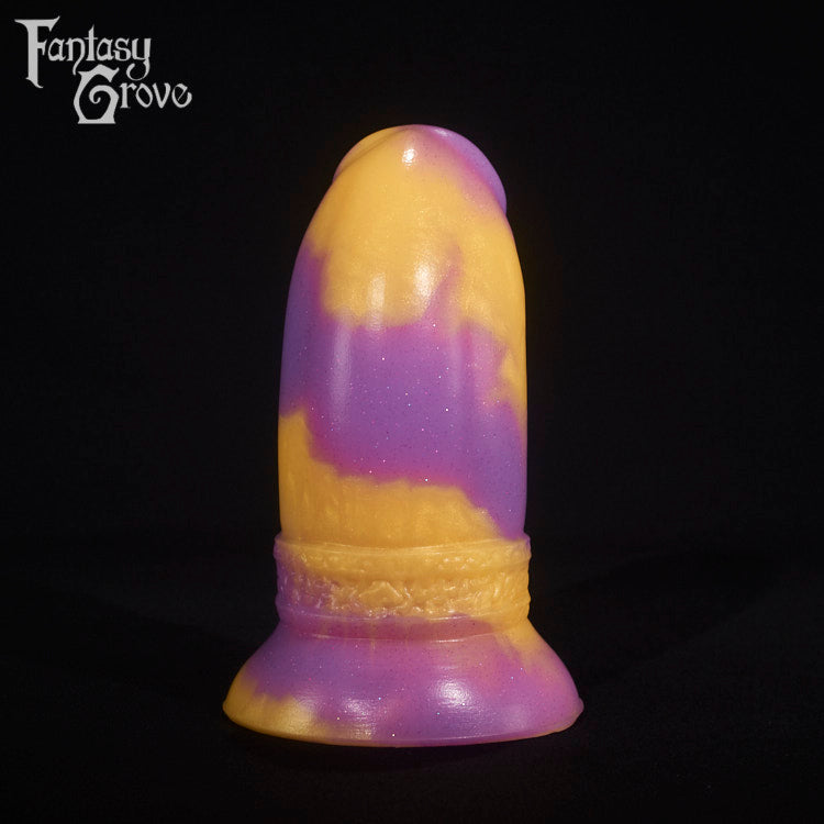 A fantasy sex toy on a black background with the Fantasy Grove logo in the upper left corner