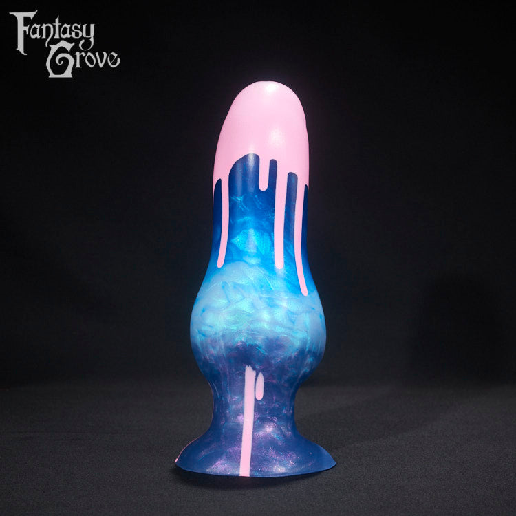 A fantasy sex toy on a black background with the Fantasy Grove logo in the upper left corner 