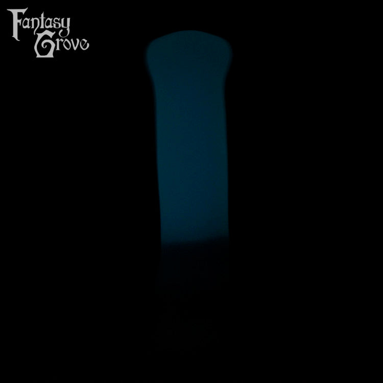 A Fantasy Grove sex toy on a black background with a logo in the upper left corner