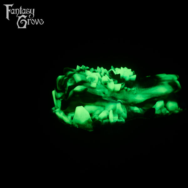 A fantasy sex toy on a black background with the Fantasy Grove logo in the upper left corner