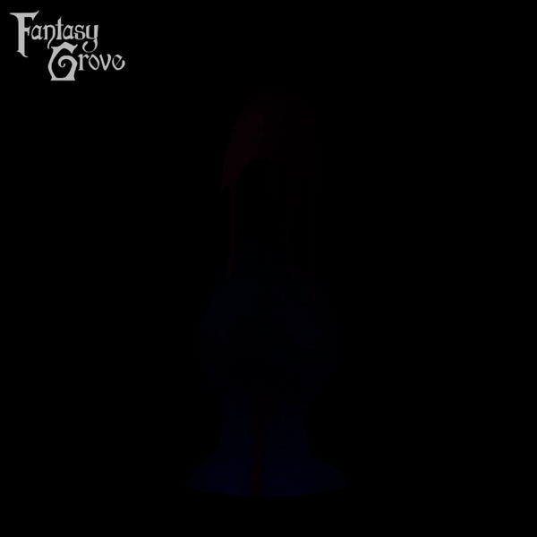A fantasy sex toy on a black background with the Fantasy Grove logo in the upper left corner 