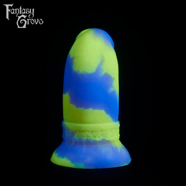 A fantasy sex toy on a black background with the Fantasy Grove logo in the upper left corner