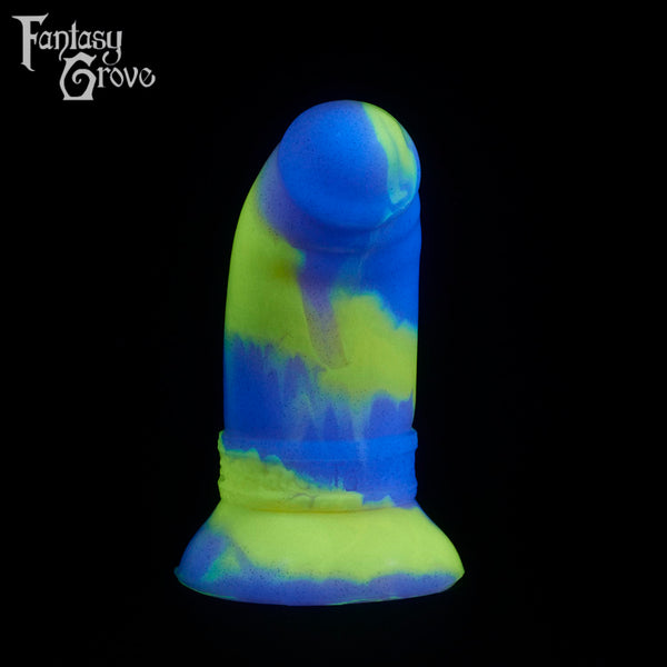 A fantasy sex toy on a black background with the Fantasy Grove logo in the upper left corner
