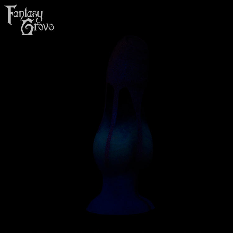 A fantasy sex toy on a black background with the Fantasy Grove logo in the upper left corner 