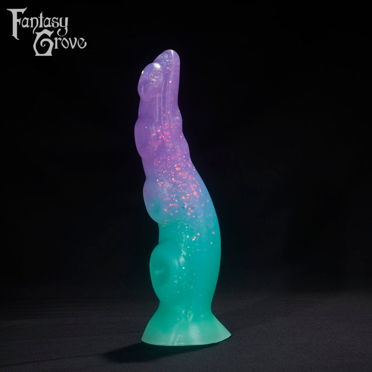 A Fantasy Grove sex toy on a black background with a logo in the upper left corner