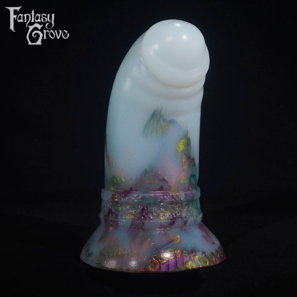 A fantasy sex toy on a black background with the Fantasy Grove logo in the upper left corner