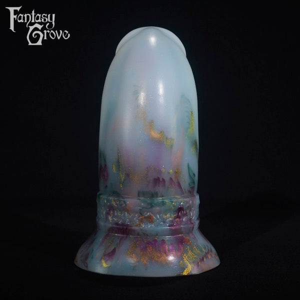 A fantasy sex toy on a black background with the Fantasy Grove logo in the upper left corner