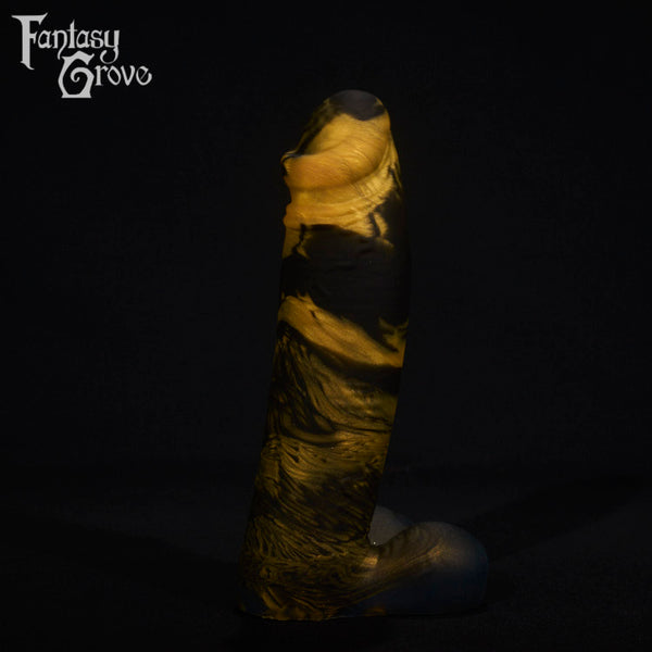 A fantasy sex toy on a black background with the Fantasy Grove logo in the upper left corner