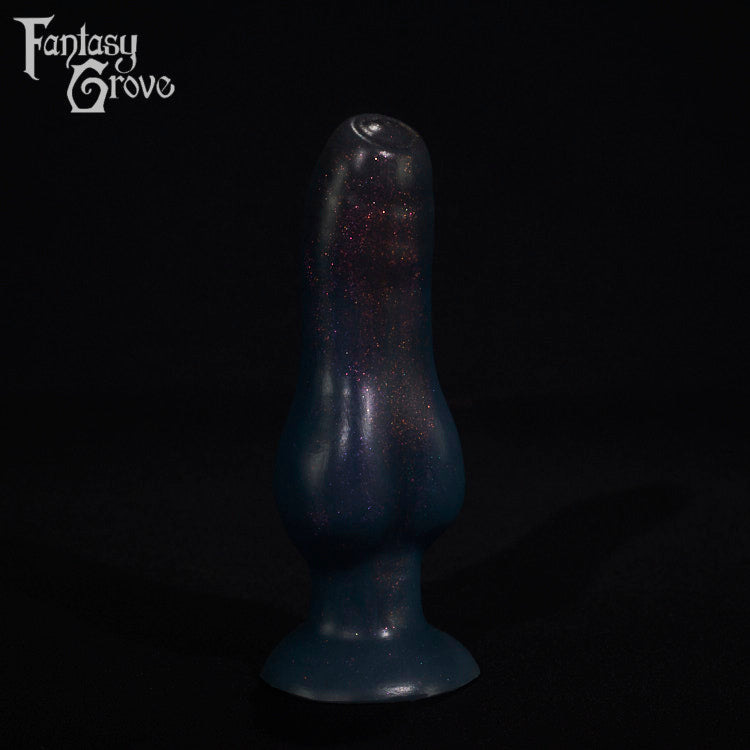 A fantasy sex toy on a black background with the Fantasy Grove logo in the upper left corner