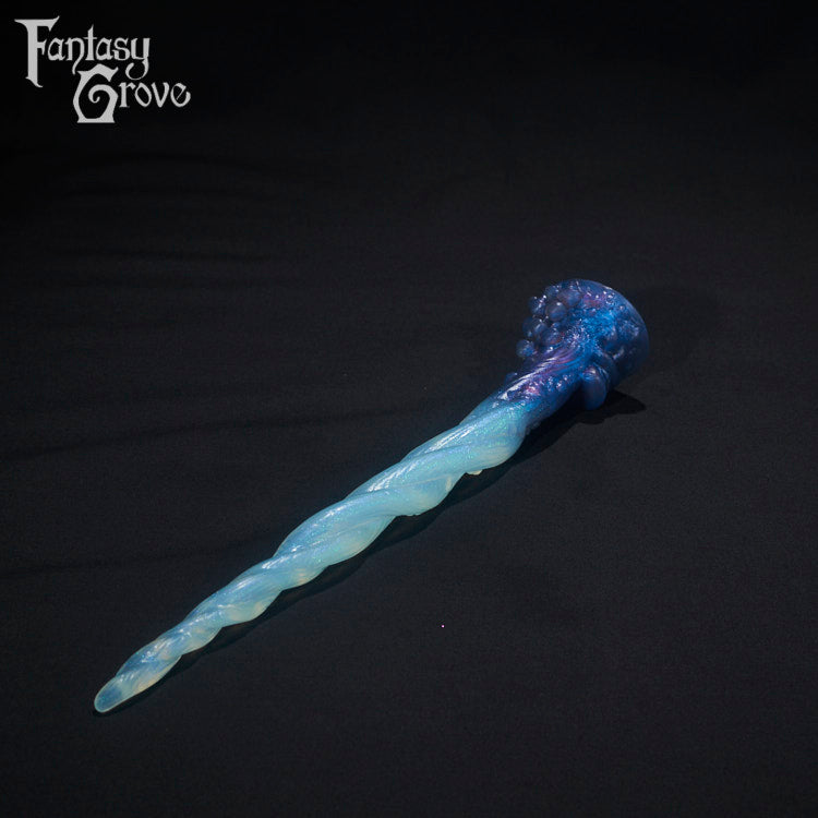 A Fantasy Grove sex toy on a black background with a logo in the upper left corner