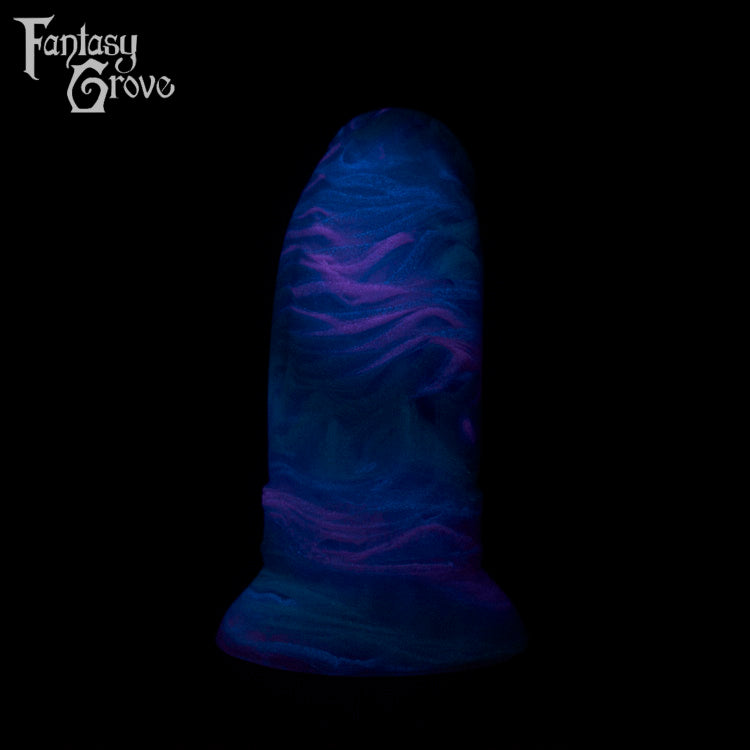 A fantasy sex toy on a black background with the Fantasy Grove logo in the upper left corner