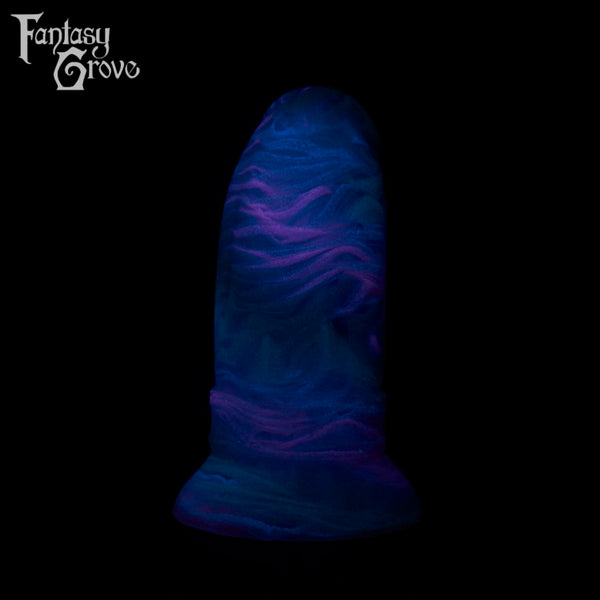 A fantasy sex toy on a black background with the Fantasy Grove logo in the upper left corner