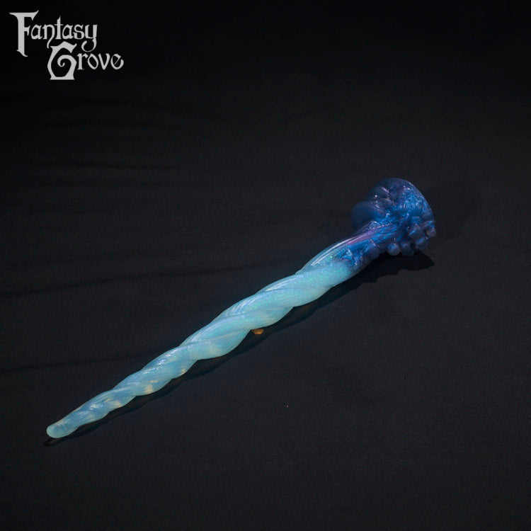 A Fantasy Grove sex toy on a black background with a logo in the upper left corner