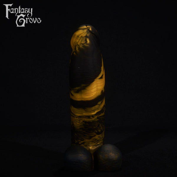 A fantasy sex toy on a black background with the Fantasy Grove logo in the upper left corner