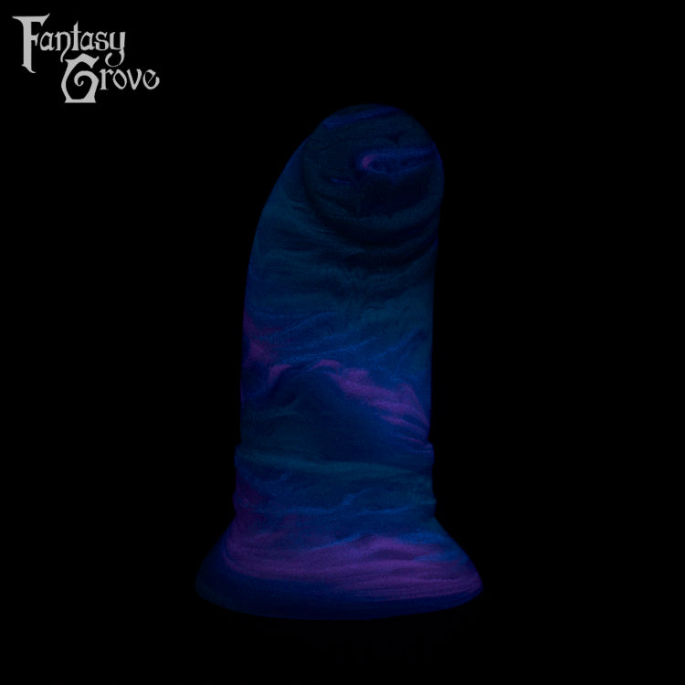 A fantasy sex toy on a black background with the Fantasy Grove logo in the upper left corner