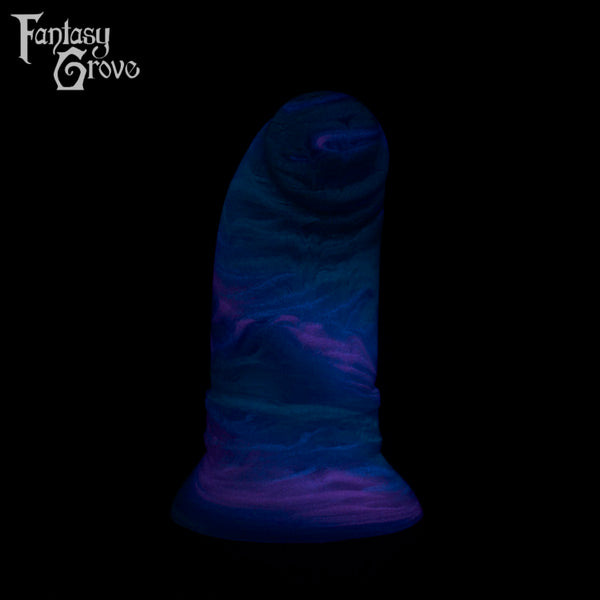 A fantasy sex toy on a black background with the Fantasy Grove logo in the upper left corner