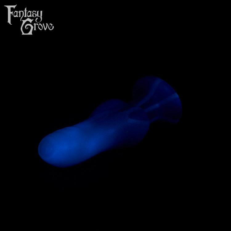 A fantasy sex toy on a black background with the Fantasy Grove logo in the upper left corner