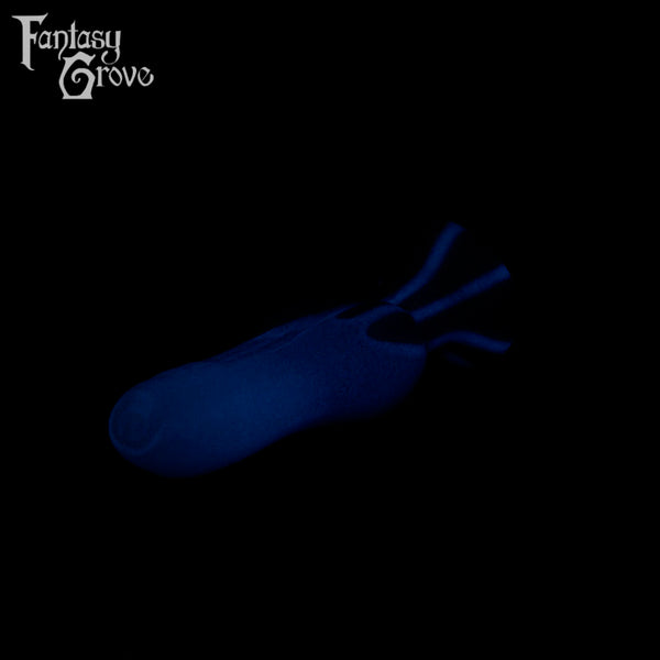 A fantasy sex toy on a black background with the Fantasy Grove logo in the upper left corner