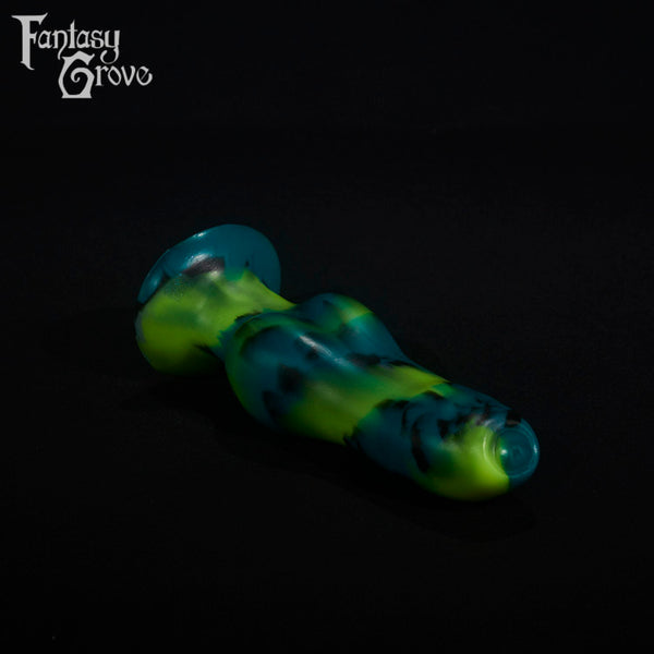 A fantasy sex toy on a black background with the Fantasy Grove logo in the upper left corner