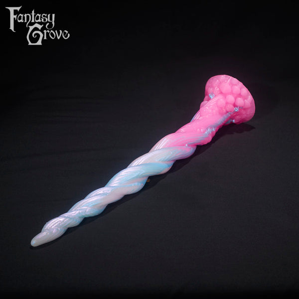 A Fantasy Grove sex toy on a black background with a logo in the upper left corner