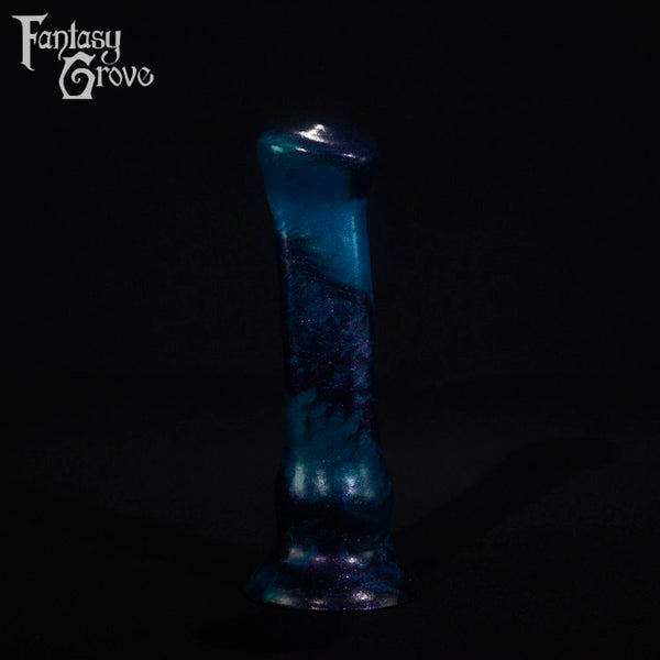A fantasy sex toy on a black background with the Fantasy Grove logo in the upper left corner