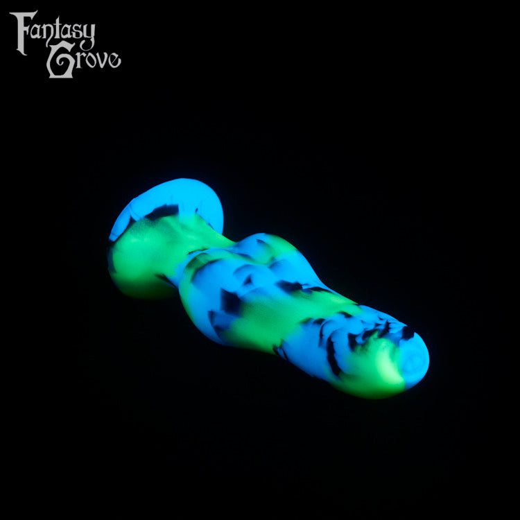 A fantasy sex toy on a black background with the Fantasy Grove logo in the upper left corner