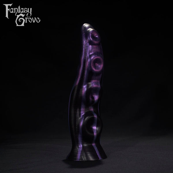 A Fantasy Grove sex toy on a black background with a logo in the upper left corner